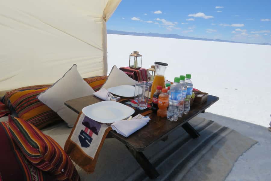 From La Paz: 1-Day 1-Night Uyuni Salt Flats Tour by Flight - Sunset, a toast, and the overnight stay