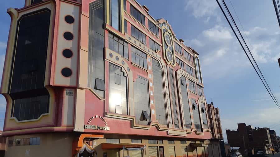 From La Paz: El Alto and Cholets Guided Day Trip - Mamani Mamani’s apartment buildings