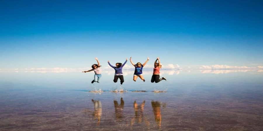 From La Paz: Trip to Uyuni Salt Flats with Wine at Sunset - Colchani and the working side of salt