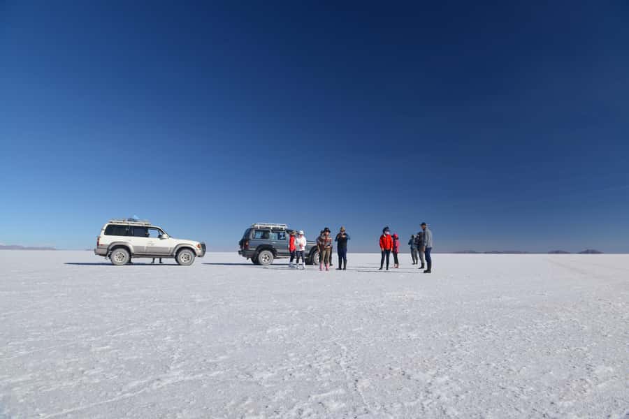 From La Paz: Uyuni Salt Flats & Lagoons 5-Day Tour - Day one: train relics, salt crust, and sunset