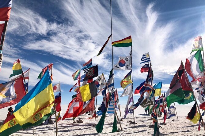 Full Day Private Tour to Salar de Uyuni - Entering the flats through salt piles and monuments