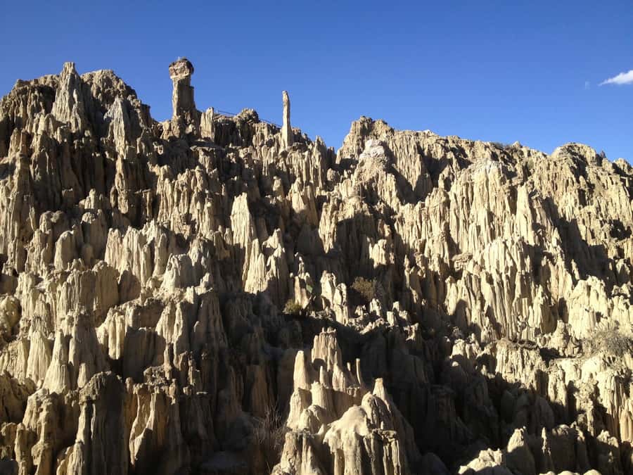 La Paz City Tour and Moon Valley - A salteña before the ride to Moon Valley
