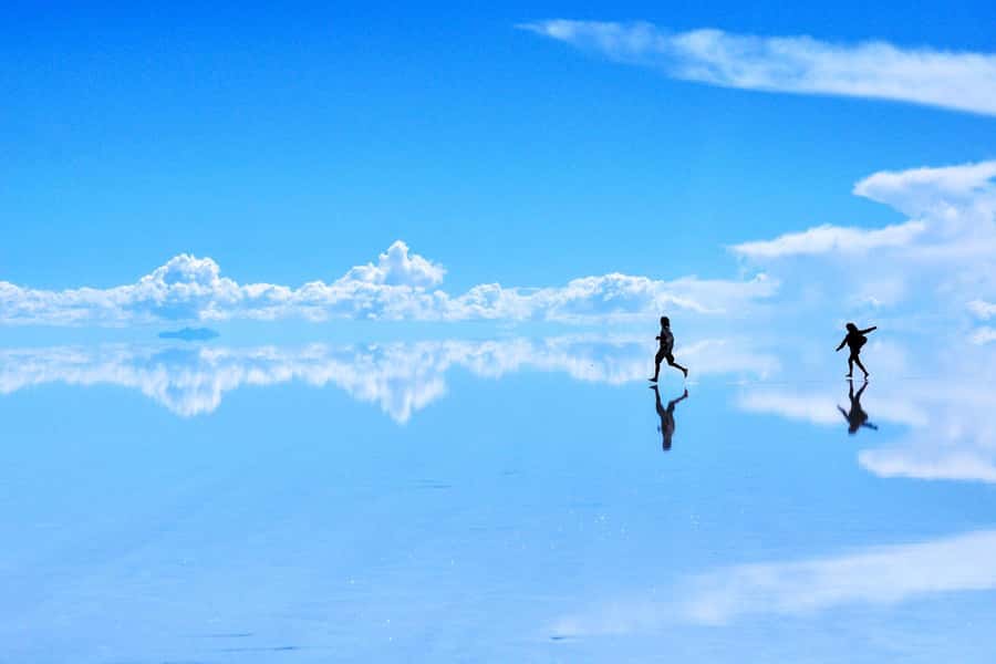 Uyuni: Classic Uyuni Salt Flats Tour + Hotel Pickup - Salt mountains and salt eyes show the flat in close-up
